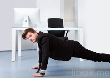 bigstock-Businessman-Doing-Pushups-65966767